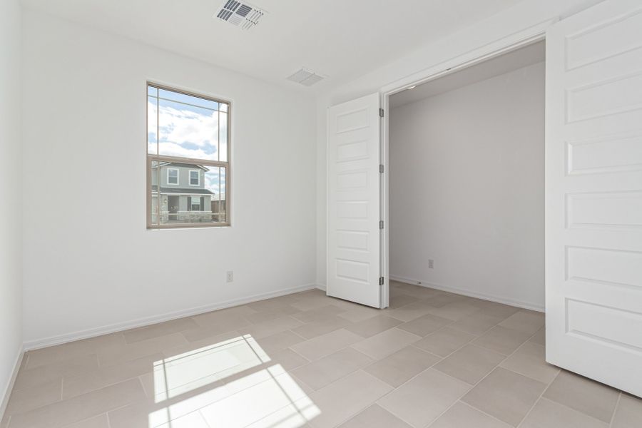 Representative unfurnished interior of a home built from the Glenstone by Taylor Morrison in Lucero Discovery Collection, Goodyear (Image 21).