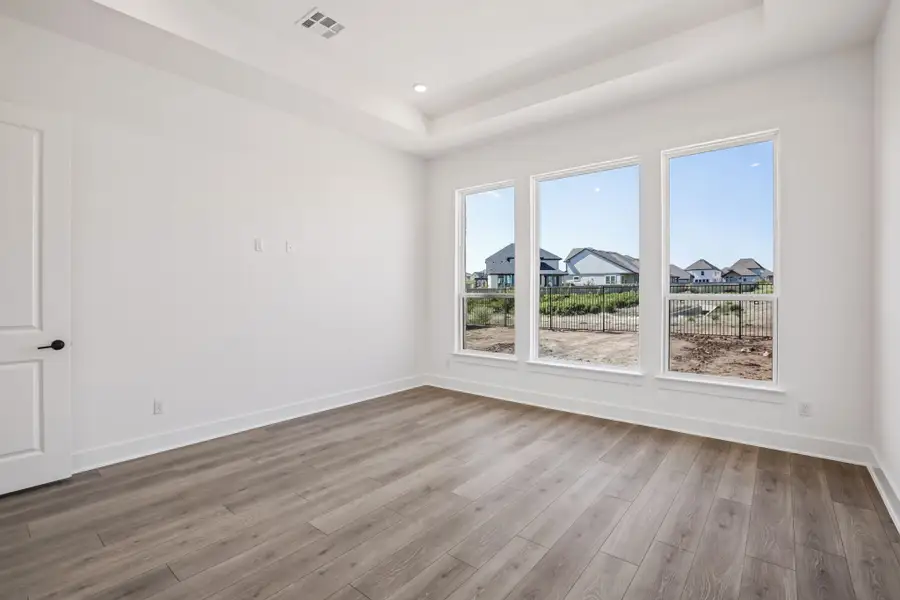 Representative unfurnished interior of a home built from the Anderson by Taylor Morrison in Easton Park, Austin (Image 31).