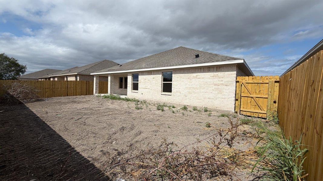 Exterior details and patio area of a home in The Lakes Northwest, Robstown (Image 2). Exterior details and patio area of a home in The Lakes Northwest, Robstown (Image 2).