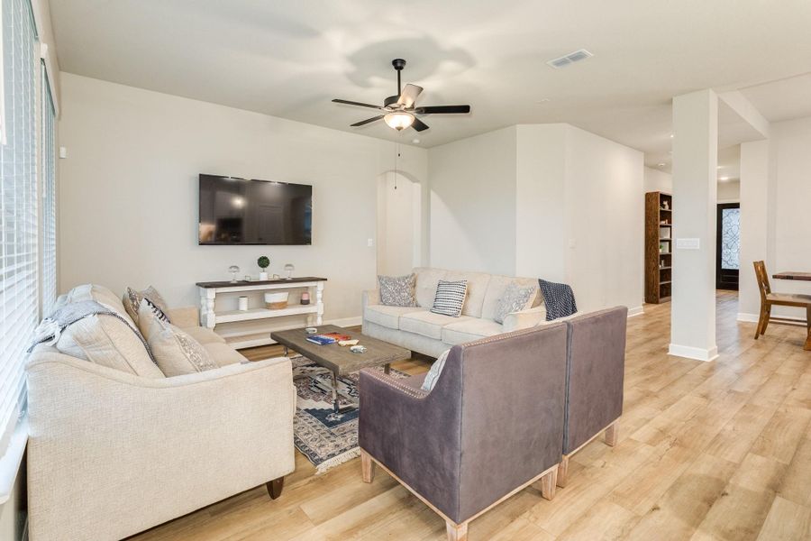 The seamless flow of the family room, kitchen, and entryway make this a true open-space home