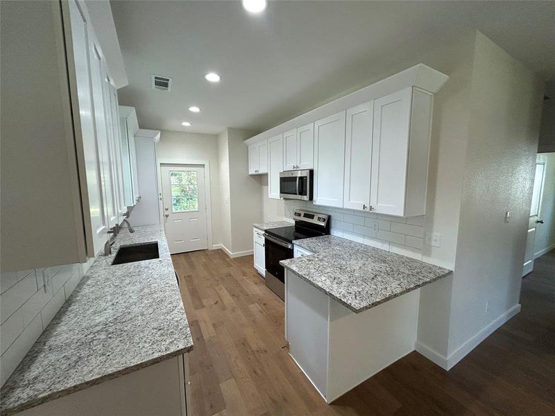 Furnished interior view inside a new home in , Denison (Image 7). Furnished interior view inside a new home in , Denison (Image 7).