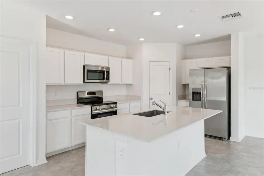 Furnished interior view inside a new home in Peace Creek Reserve: Legacy Collection, Winter Haven (Image 3). Furnished interior view inside a new home in Peace Creek Reserve: Legacy Collection, Winter Haven (Image 3).