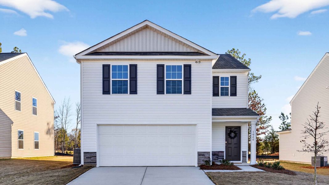 Front exterior of a new home in Huffman Ridge, Hickory, NC, highlighting curb appeal (Image 1). Front exterior of a new home in Huffman Ridge, Hickory, NC, highlighting curb appeal (Image 1).