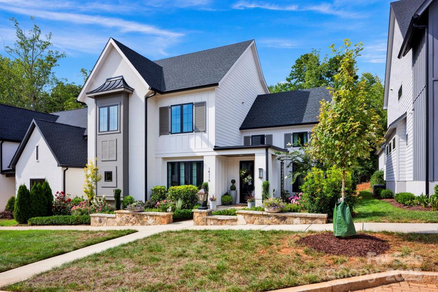 Front exterior of a new home in , Davidson, NC, highlighting curb appeal (Image 19).