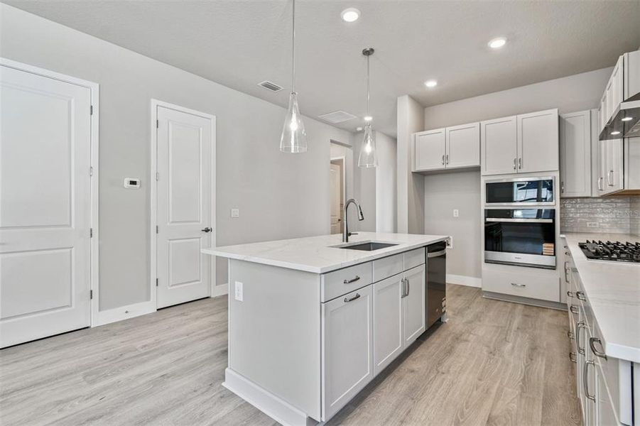 Furnished interior view inside a new home in Emerald Landing at Waterside at Lakewood Ranch – Cottage Series, Sarasota (Image 13). Furnished interior view inside a new home in Emerald Landing at Waterside at Lakewood Ranch – Cottage Series, Sarasota (Image 13).