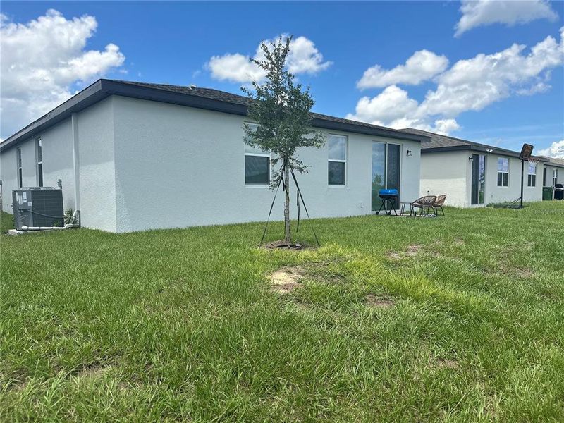 Exterior details and patio area of a home in Villamar - Signature Series, Winter Haven (Image 4).