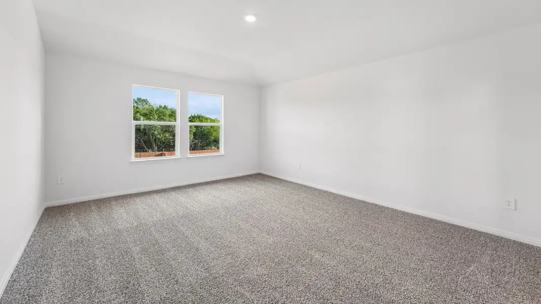 Spacious, unfurnished interior of a new home in Bar W Ranch, Leander (Image 32).