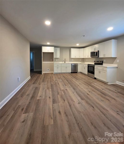 Spacious, unfurnished interior of a new home in , Albemarle (Image 12).