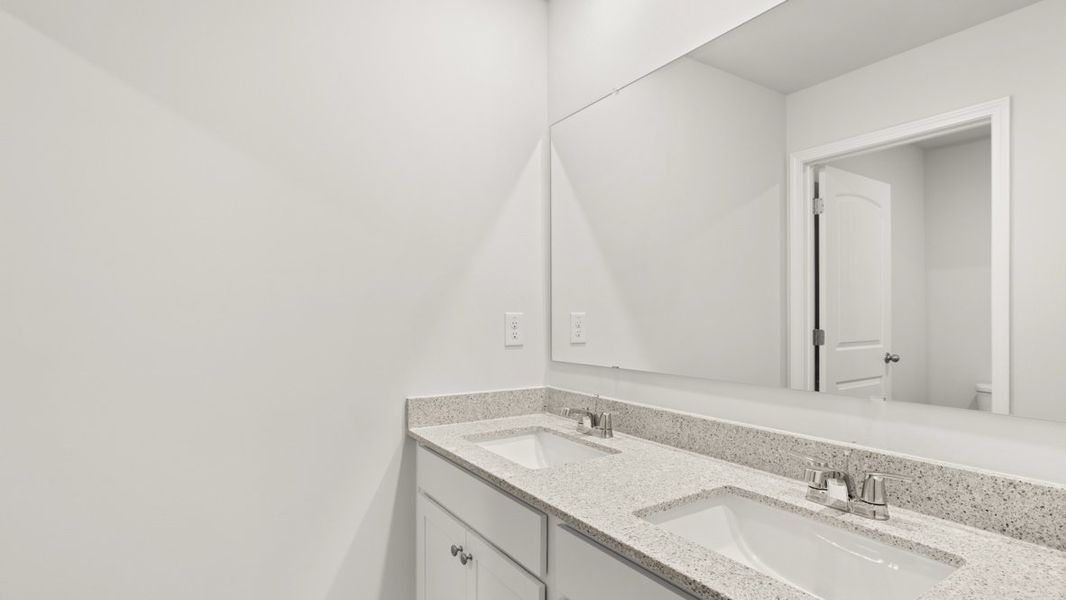 Representative furnished interior of a home built from the Hayden by D.R. Horton in Liberty Crossing, Braselton (Image 13).