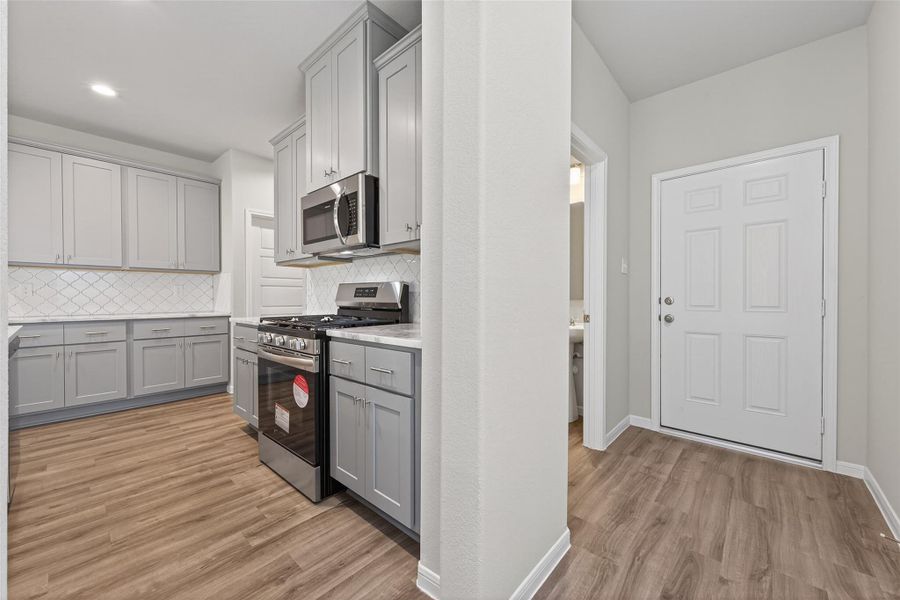 Furnished interior view inside a new home in Woodland Lakes, Huffman (Image 15).