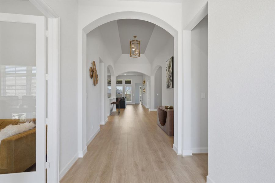 Stunning entryway with elegant arches that sets the tone for this beautiful home. Stunning entryway with elegant arches that sets the tone for this beautiful home.