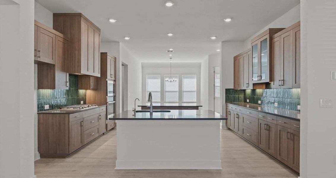 Representative furnished interior of a home built from the Samantha by Chesmar Homes in Village at Three Oaks, Seguin (Image 4).