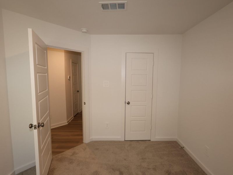 Spacious, unfurnished interior of a new home in Pinewood at Grand Texas, New Caney (Image 19). Spacious, unfurnished interior of a new home in Pinewood at Grand Texas, New Caney (Image 19).