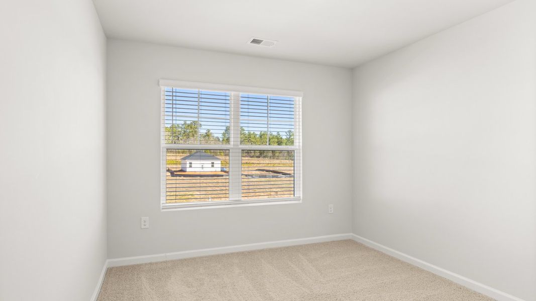 Spacious, unfurnished interior of a new home in Byrd Village, Graniteville (Image 20).