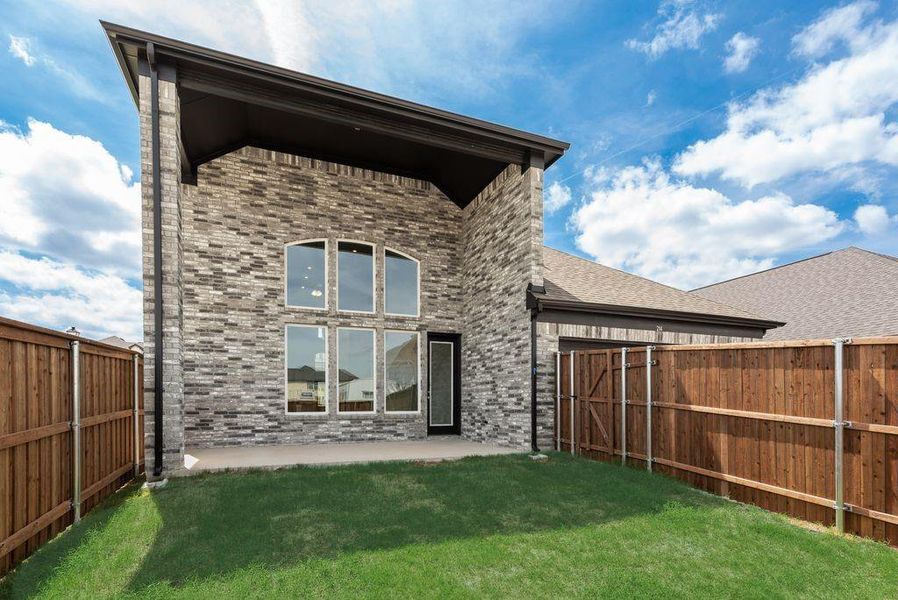 Exterior details and patio area of a home in Edgewater, Fate (Image 3).