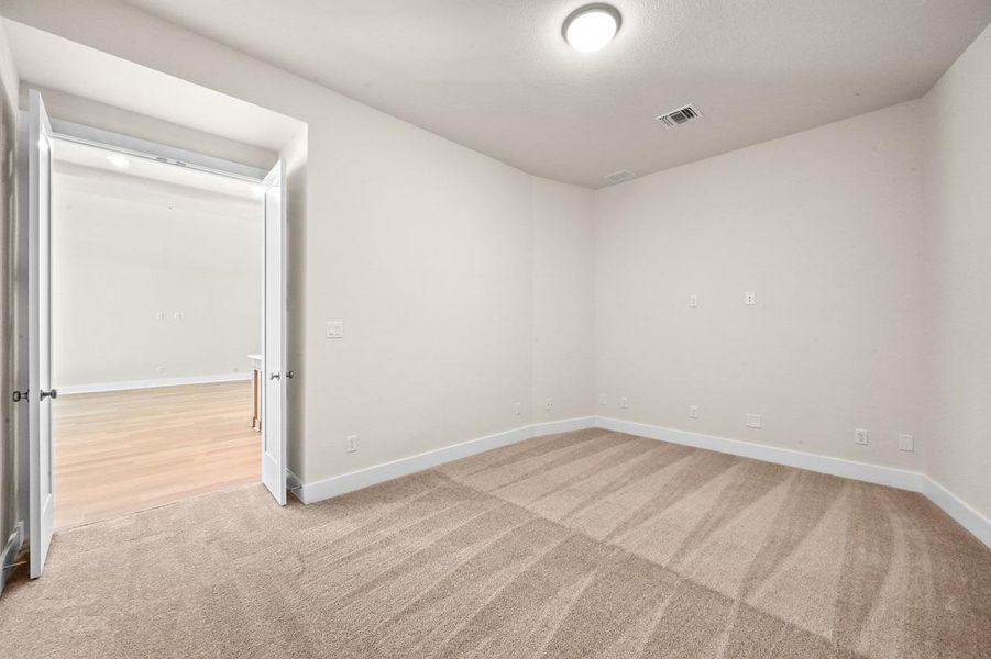 Spacious, unfurnished interior of a new home in 6 Creeks at Waterridge: 70ft. lots, Kyle (Image 21).