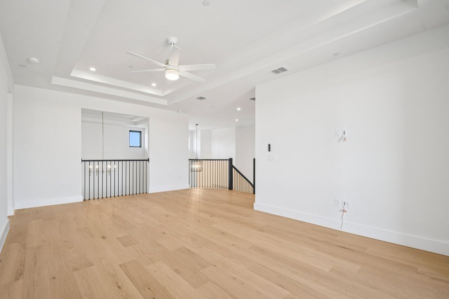 Spacious, unfurnished interior of a new home in Milky Way at River Place, Austin (Image 31).