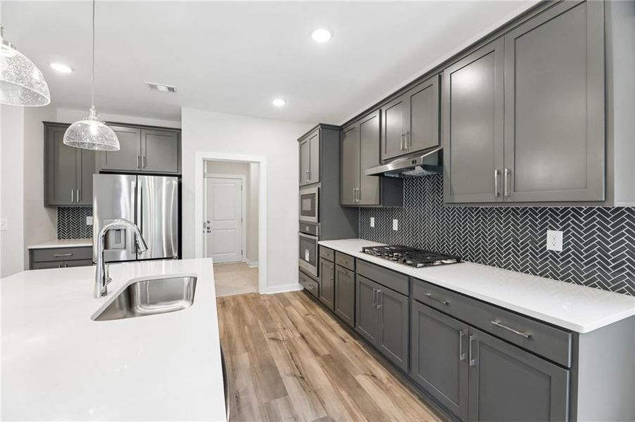 Furnished interior view inside a new home in The Park at Brighton, Locust Grove (Image 7).