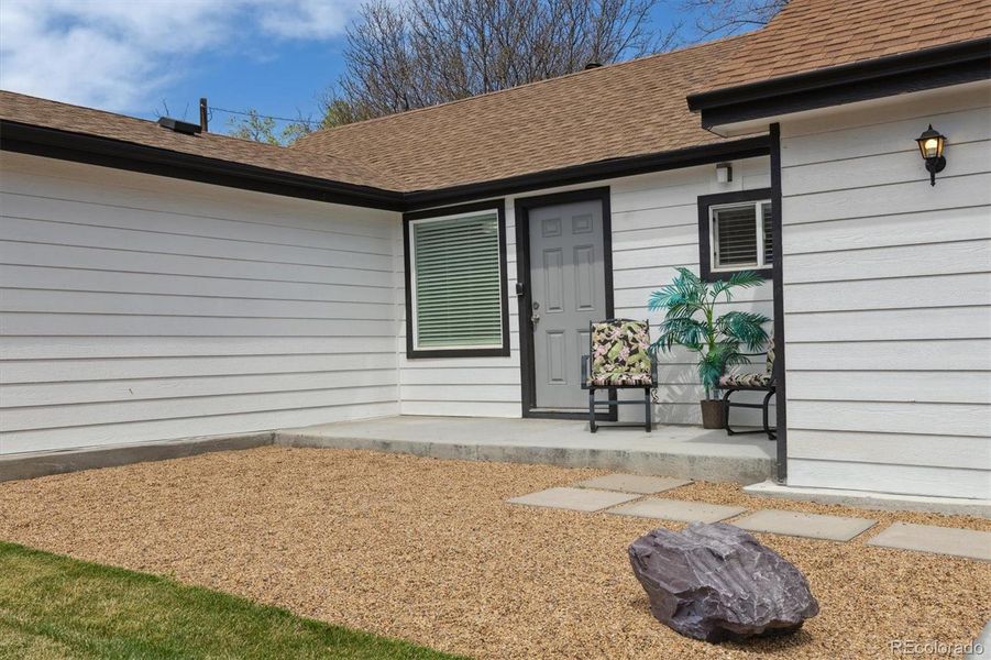 Front exterior of a new home in , Lakewood, CO, highlighting curb appeal (Image 20).