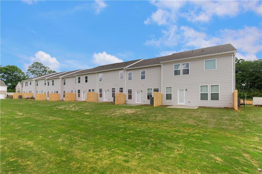 Exterior details and patio area of a home in Avery Landing, McDonough (Image 25).