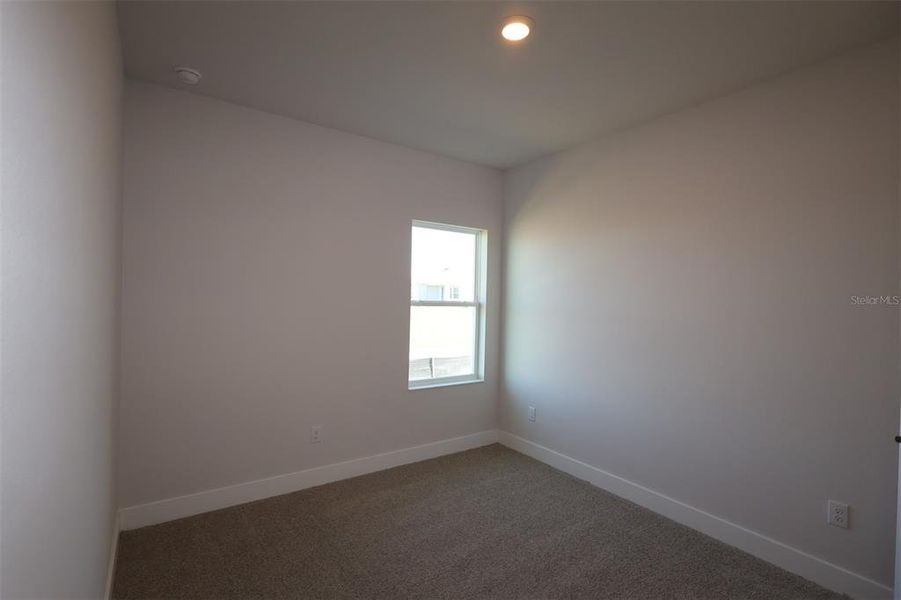 Spacious, unfurnished interior of a new home in Waterset Classic Series, Apollo Beach (Image 11).