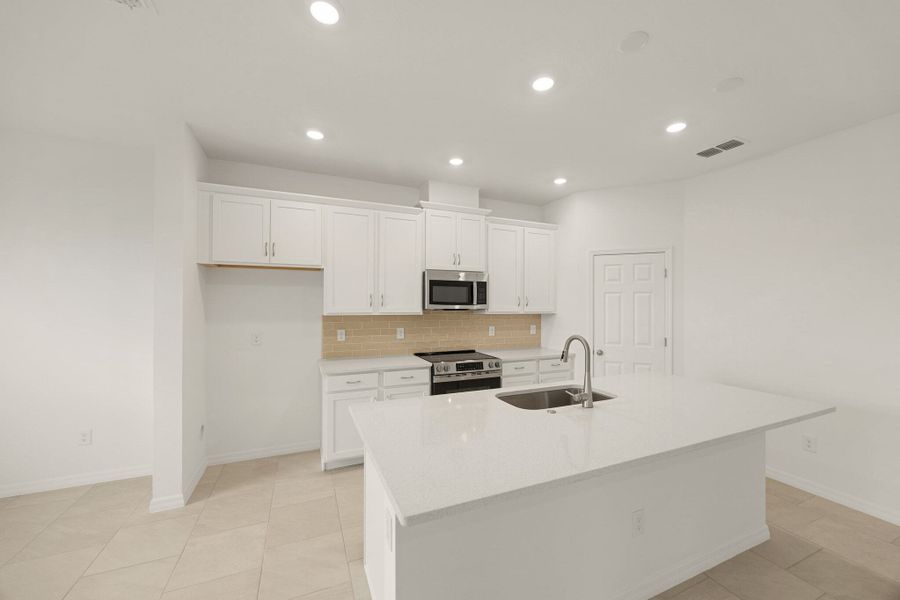 Furnished interior view inside a new home in Brack Ranch, St. Cloud (Image 3).