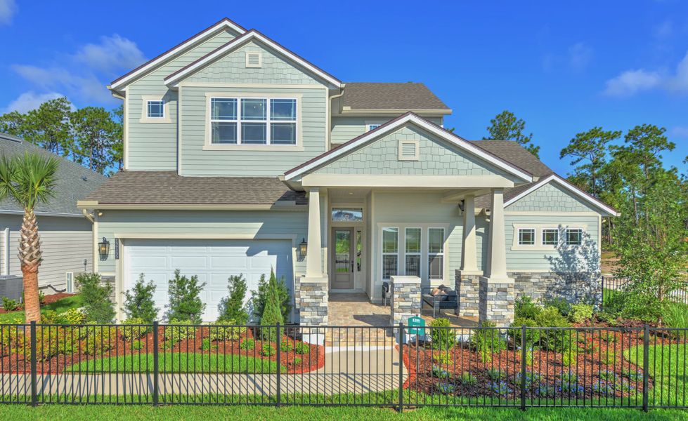 Front exterior of a new home in Seven Pines, Jacksonville, FL, highlighting curb appeal (Image 2).