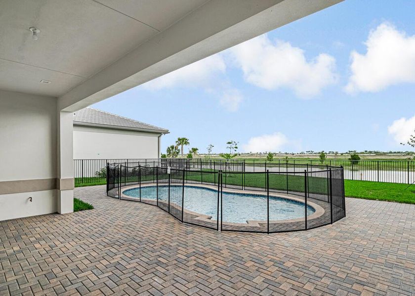 Exterior details and patio area of a home in Apex at Avenir, Palm Beach Gardens (Image 31).