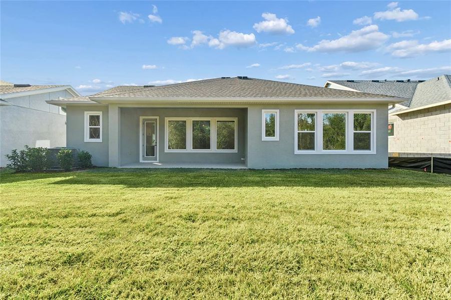 Exterior details and patio area of a home in Chapel Crossings, Wesley Chapel (Image 24).
