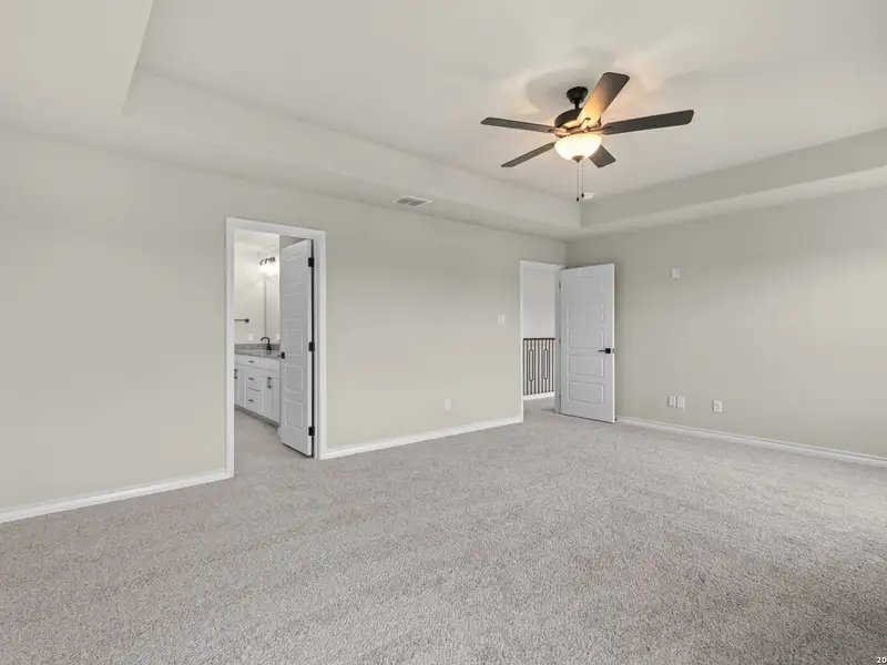 Spacious, unfurnished interior of a new home in The Reserve at Potranco Oaks, Castroville (Image 39).
