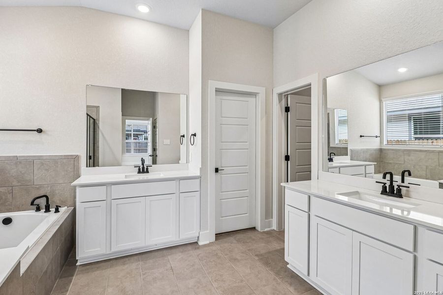 Furnished interior view inside a new home in Estancia Ranch - Classic Series, San Antonio (Image 12).