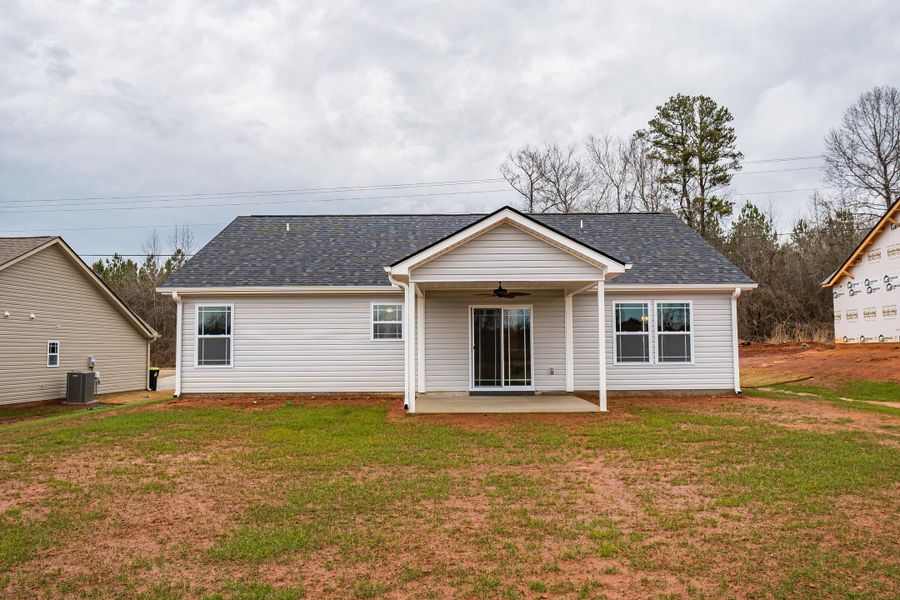 Representative exterior photo of a completed home built from the Saxon by Enchanted Homes in Huckleberry Cove, Chesnee, SC (Image 26). Representative exterior photo of a completed home built from the Saxon by Enchanted Homes in Huckleberry Cove, Chesnee, SC (Image 26).