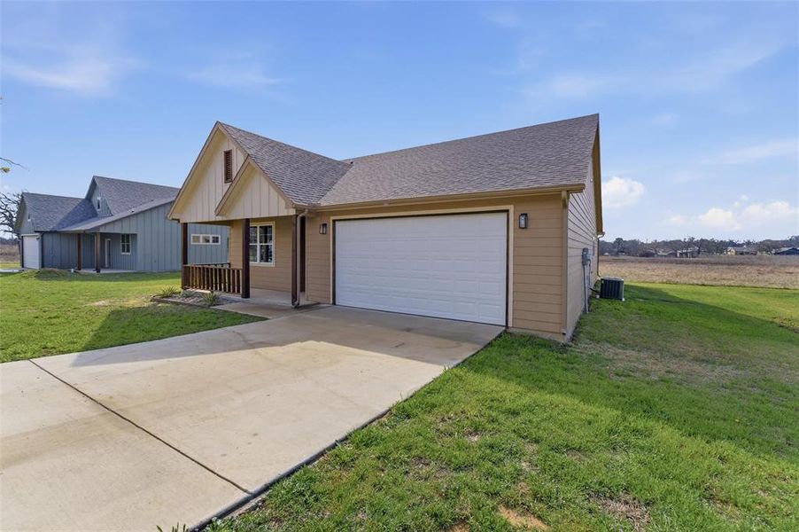 Angled exterior view showcasing the home and attached garage. Angled exterior view showcasing the home and attached garage.