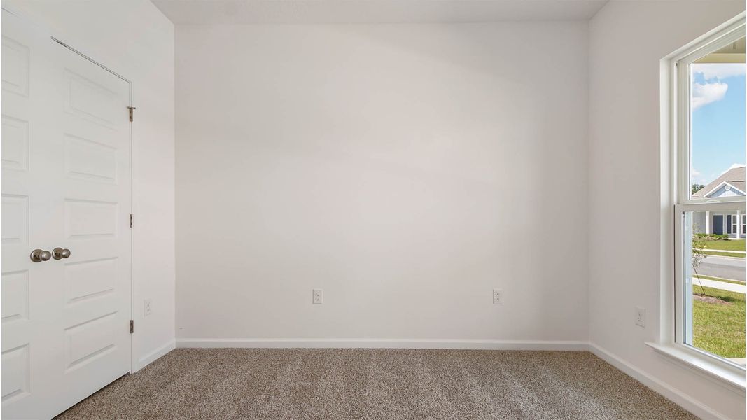 Representative unfurnished interior of a home built from the Aspen by D.R. Horton in Owl's Head East, Freeport (Image 29).