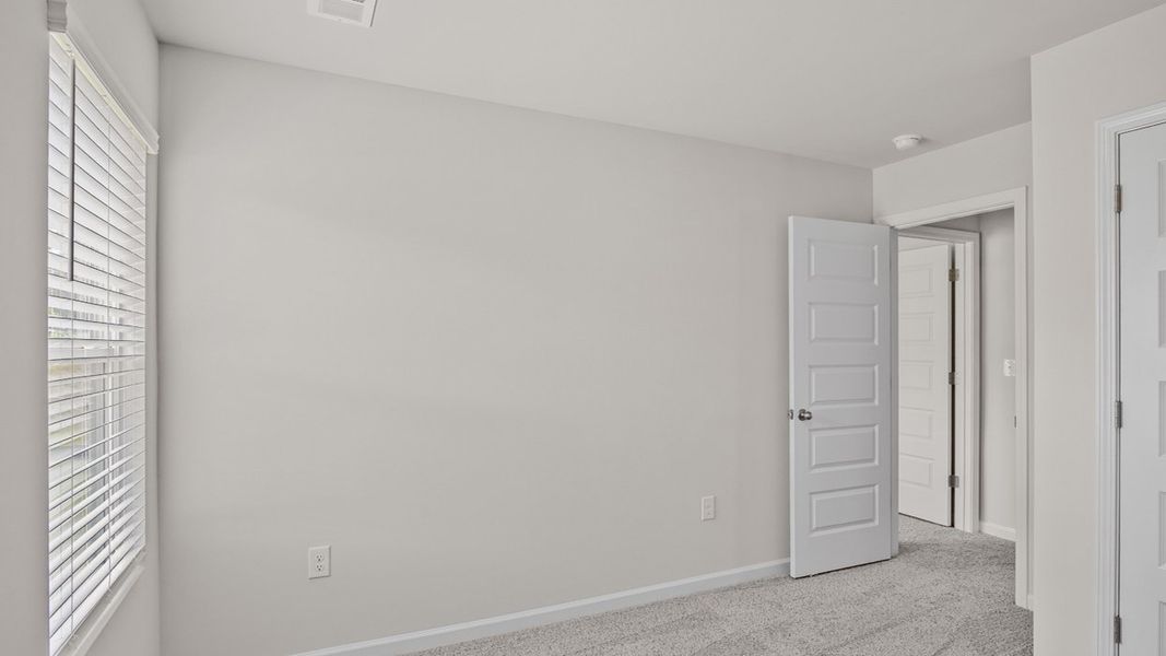 Spacious, unfurnished interior of a new home in Bellemeade Landing, Augusta (Image 23).