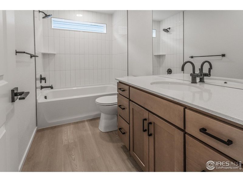 Furnished interior view inside a new home in Prairie Song Story Collection - Single Family Homes, Windsor (Image 9).