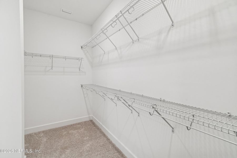 Spacious, unfurnished interior of a new home in Evergreen Island at Silverleaf - Executive, St. Augustine (Image 23).