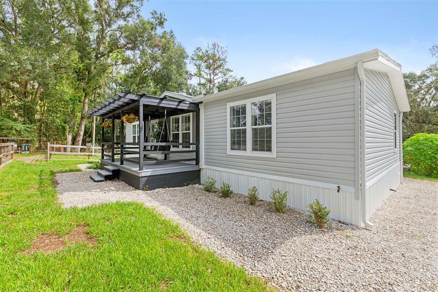 Exterior details and patio area of a home in , Brooksville (Image 31).