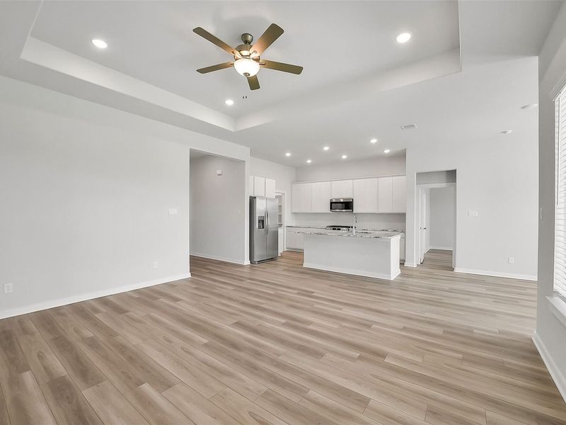 Spacious, unfurnished interior of a new home in Sunterra, Katy (Image 22).