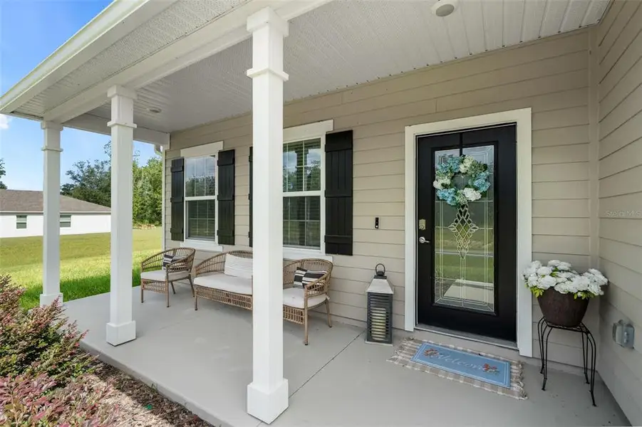 Exterior details and patio area of a home in , Lake City (Image 26). Exterior details and patio area of a home in , Lake City (Image 26).