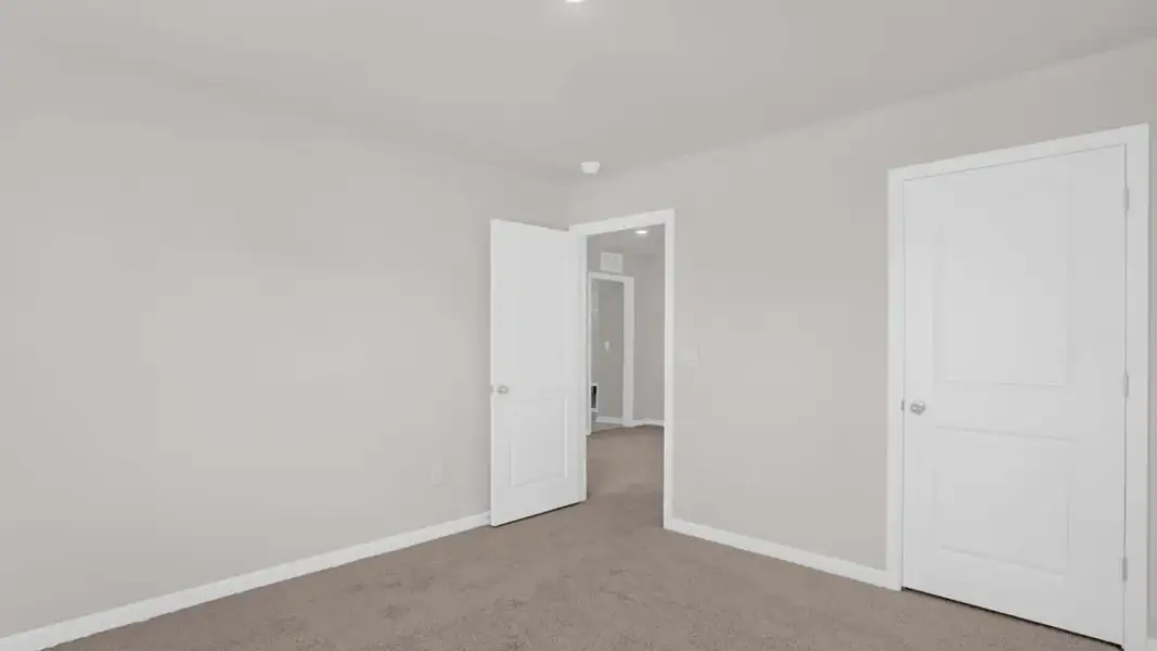 Spacious, unfurnished interior of a new home in The Estates Park, Apex (Image 27).
