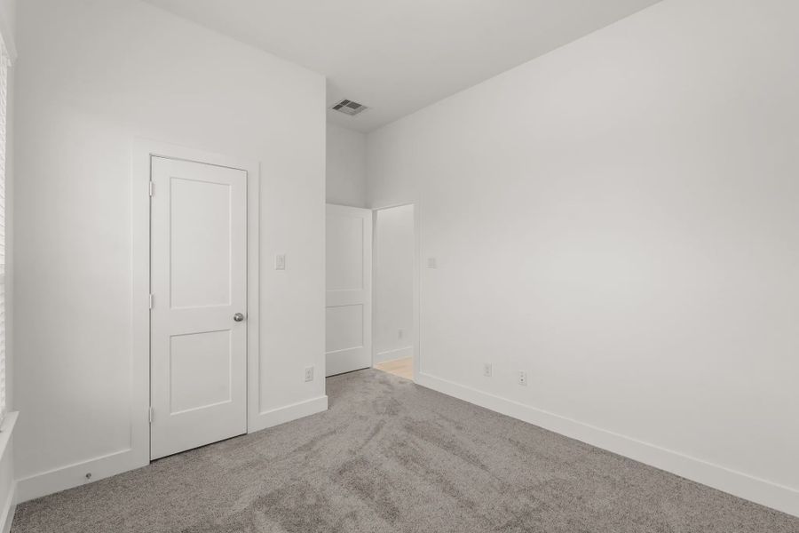 Representative unfurnished interior of a home built from the Fairway by Chesmar Homes in Riceland Alley Loads, Mont Belvieu (Image 19).