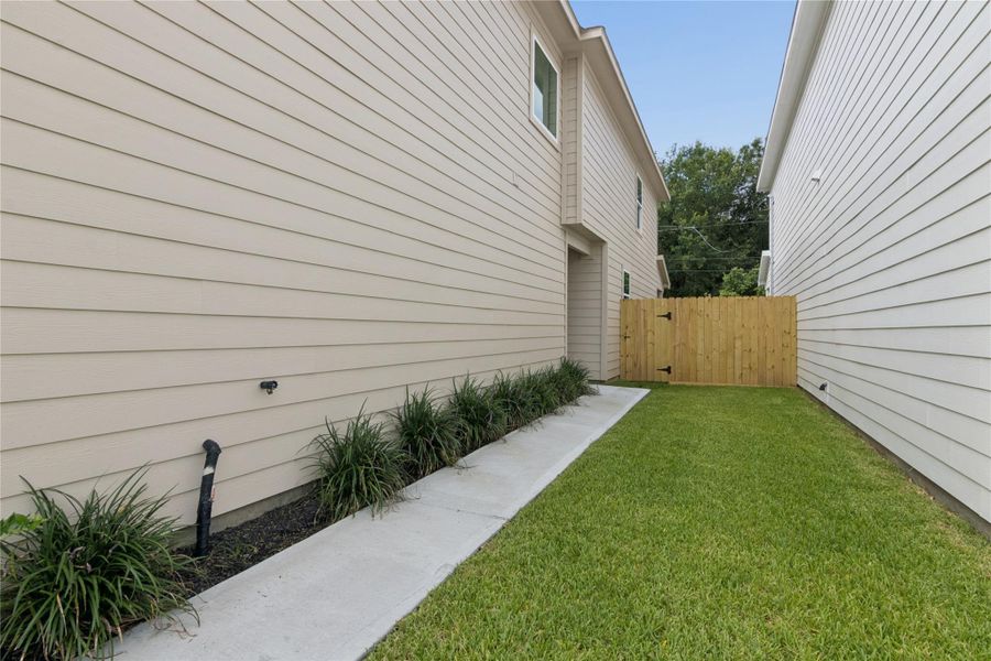 Exterior details and patio area of a home in , Houston (Image 19). Exterior details and patio area of a home in , Houston (Image 19).