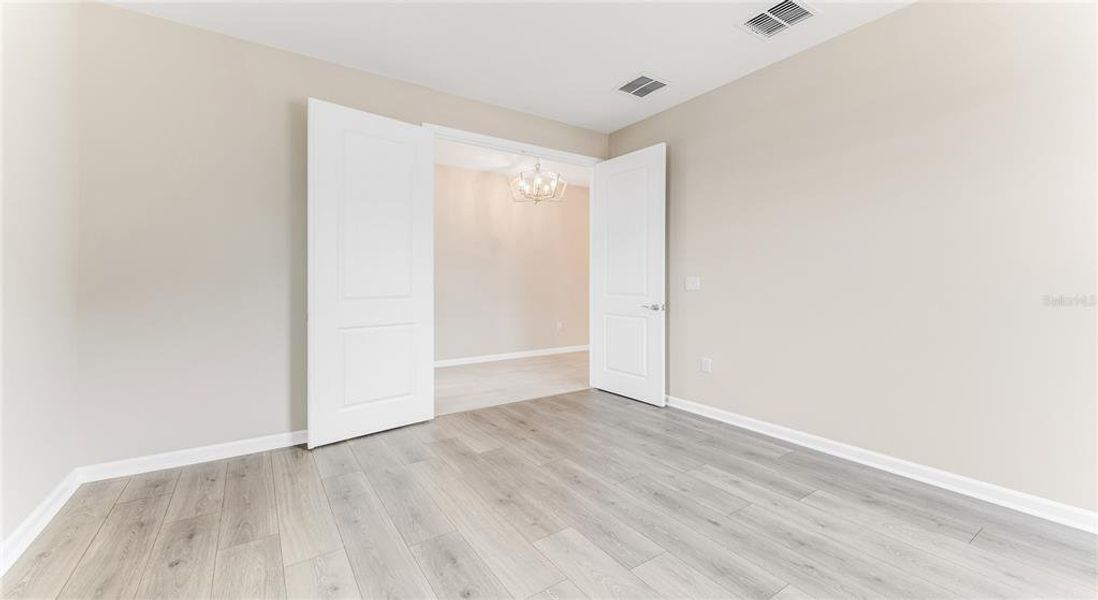 Spacious, unfurnished interior of a new home in Cresswind DeLand, Deland (Image 24).