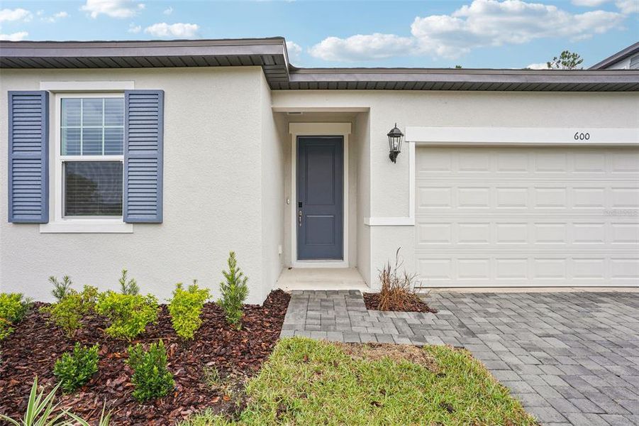 Exterior details and patio area of a home in Ridgehaven - Signature Series, Ormond Beach (Image 3).
