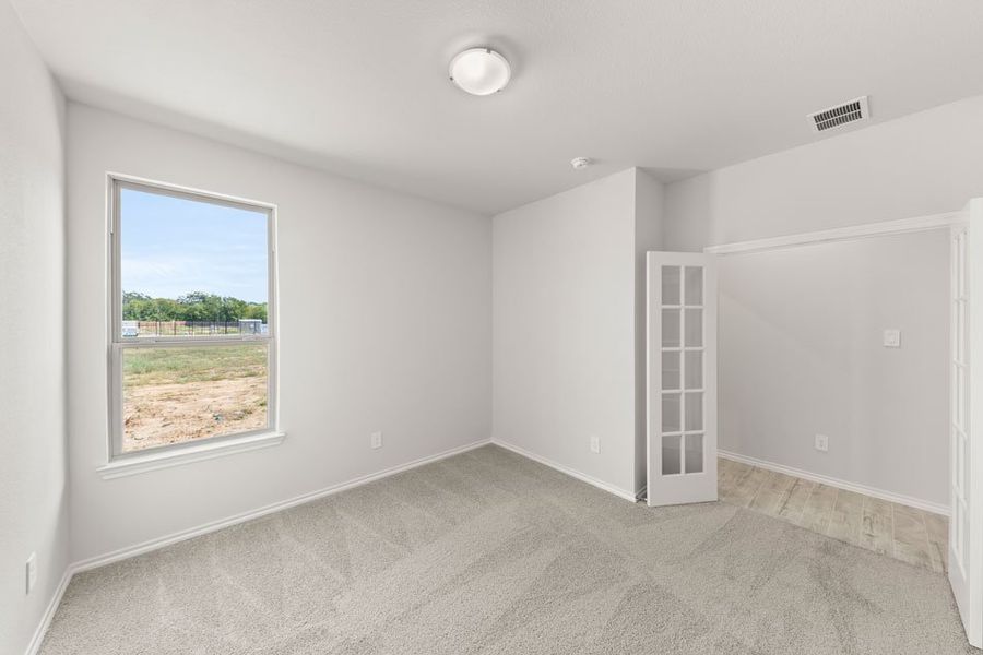 Front exterior of a new home in Keeneland, Aubrey, TX, highlighting curb appeal (Image 7).