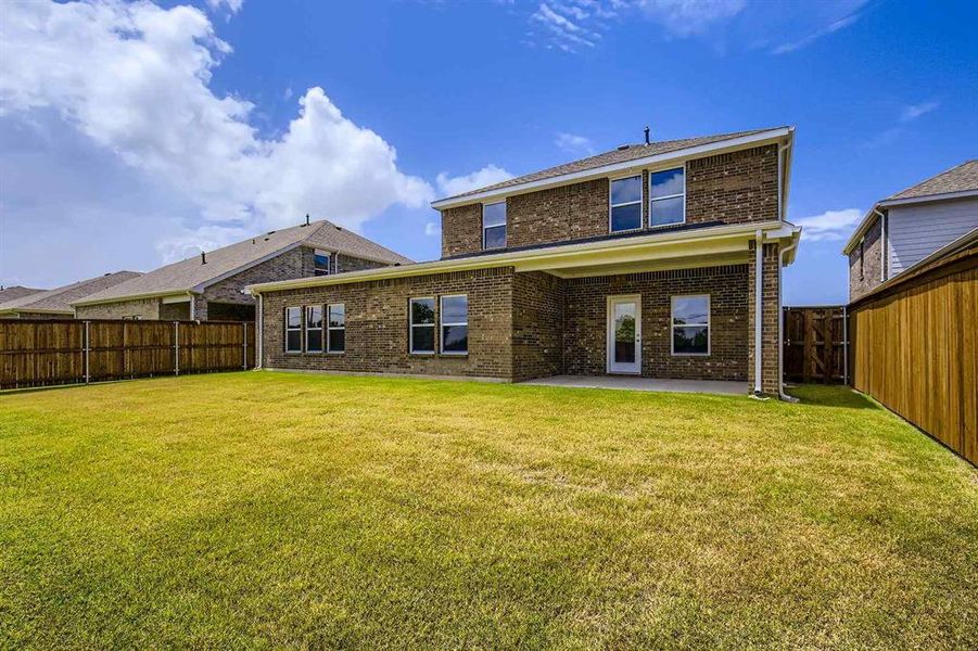 Exterior details and patio area of a home in Prestige Collection at Overland Grove, Forney (Image 2). Exterior details and patio area of a home in Prestige Collection at Overland Grove, Forney (Image 2).