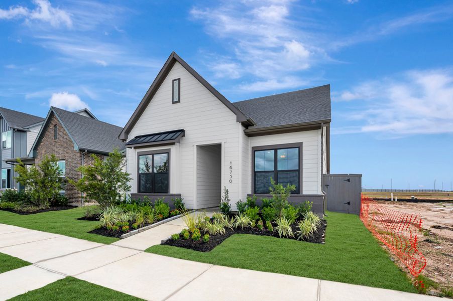 Front exterior of a new home in Jubilee - Grove Row Collection, Hockley, TX, highlighting curb appeal (Image 28).