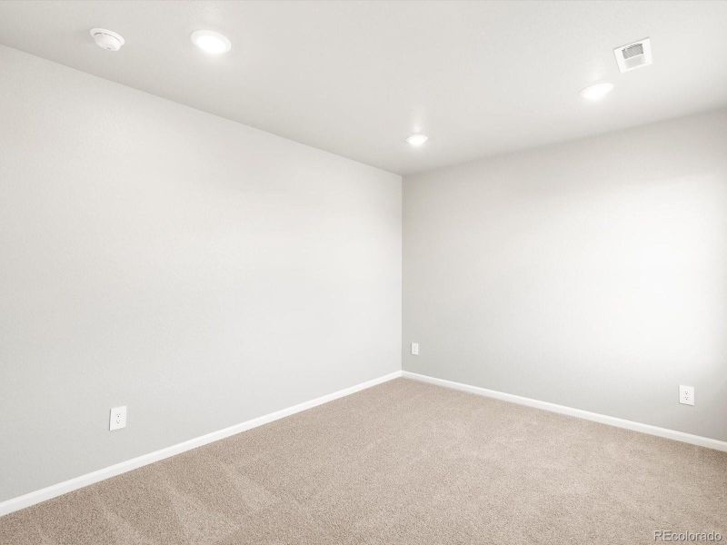 Spacious, unfurnished interior of a new home in Buffalo Highlands: The Flora Collection, Commerce City (Image 22).