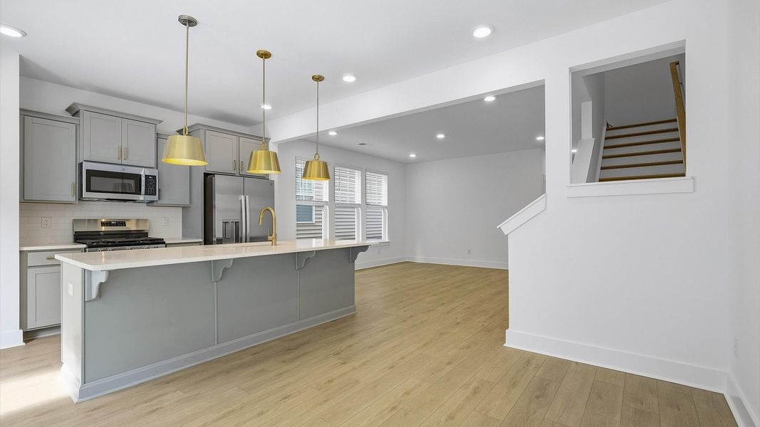 Inviting breakfast area with a seamless connection to the kitchen for everyday living at El Dorado Inviting breakfast area with a seamless connection to the kitchen for everyday living at El Dorado